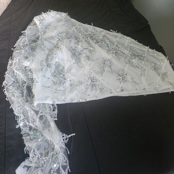 Sparkly one sleeve white and sequin top. - Picture 1 of 3